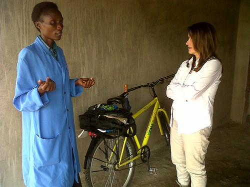 A newly qualified Community Health Assistant meets with Lynne Featherstone International Development Minister Lynne Featherstone meets with a newly qualified Community Health Assistant and travels with her to a household in a rural location. The assistant shows the Minister her bike, provided by the Ministry of Health in Zambia, which she uses to visit rural families in Monze, Southern Province. UK aid is training a new cadre of 300 Community Health Assistants to deliver health services in rural areas.