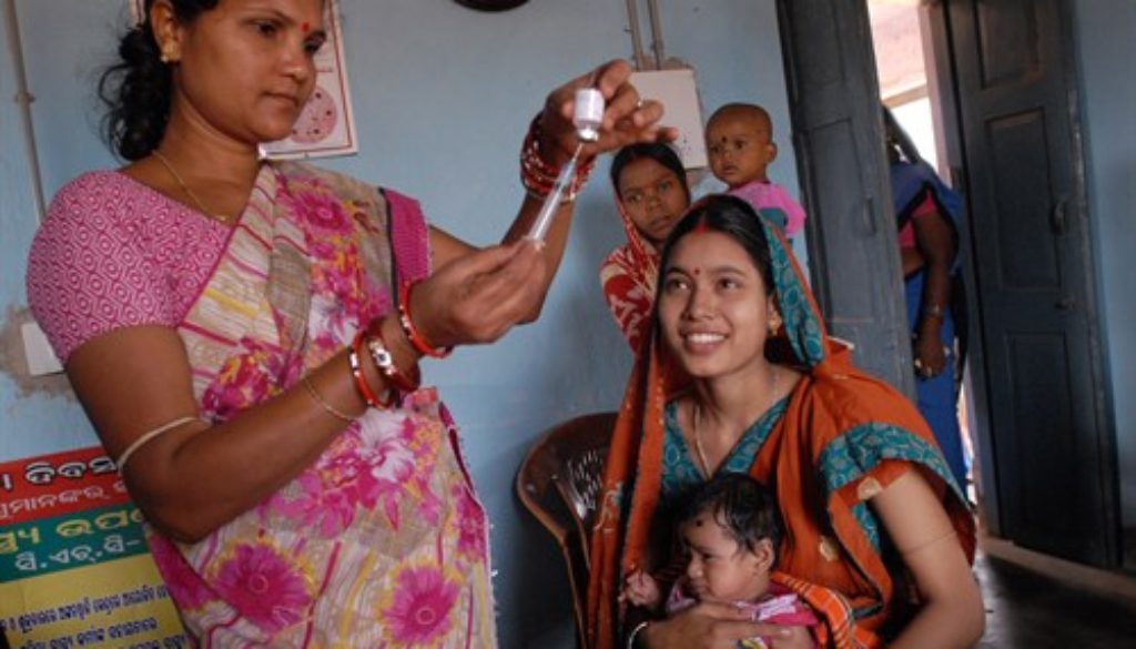 Photo: Pippa Ranger, Innovation Advisor, DFID. Community health worker, Rebati, gives babies like Adilya, polio and other life saving vaccinations for at least the first year of their lives. Britain is working with the Government of Odisha, one of India's poorest states, and UNICEF, to save the lives of thousands of mums and babies.