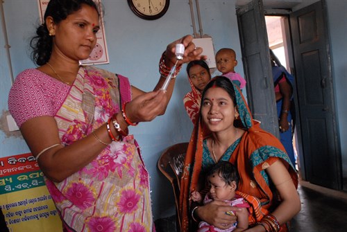 Photo: Pippa Ranger, Innovation Advisor, DFID. Community health worker, Rebati, gives babies like Adilya, polio and other life saving vaccinations for at least the first year of their lives. Britain is working with the Government of Odisha, one of India's poorest states, and UNICEF, to save the lives of thousands of mums and babies.