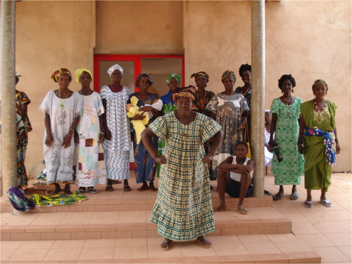 Photographer: Polly Walker Title: No na trabadja pa no tabanca (we are working for our village); Traditional Birth Attendants pose after newborn training in Guinea Bissau. Location: Buba, Quinara region, Guinea Bissau