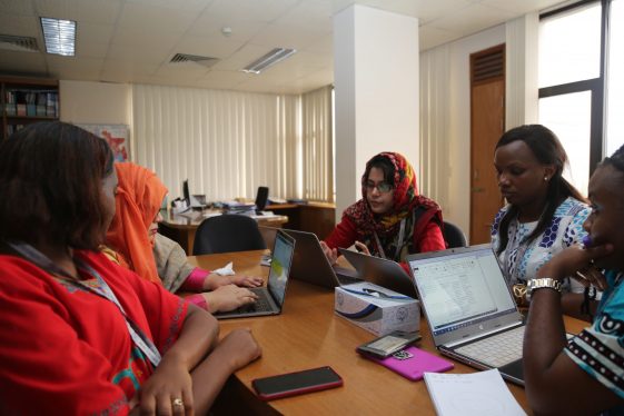 ARISE team hard at work with their laptops